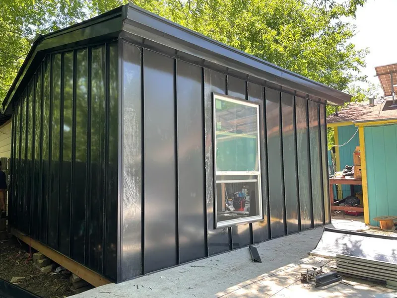 Black standing seam metal wall panels for Roof Inspection in Venus