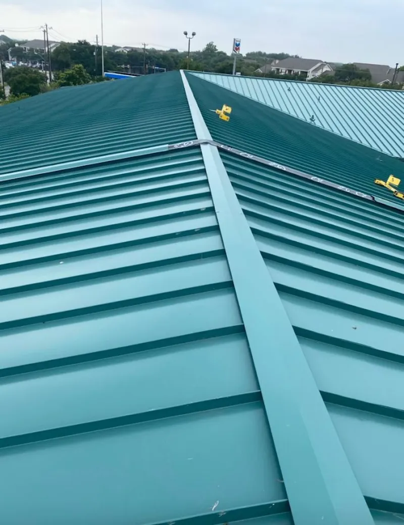 Green commercial metal roof ridge and valley for Metal Roof Repair in Venus